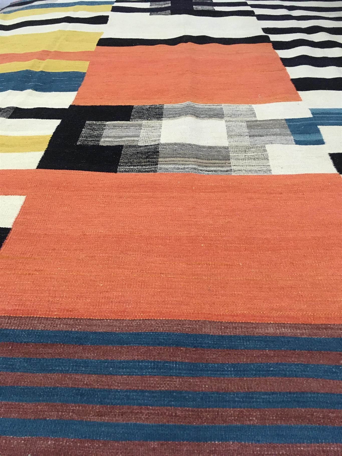 Explore our exquisite collection of handmade rugs, ranging from antique and vintage to modern designs. Each rug is a testament to skilled craftsmanship, offering timeless beauty and elegance. Elevate your space with the warmth and artistry of our handcrafted carpets.
