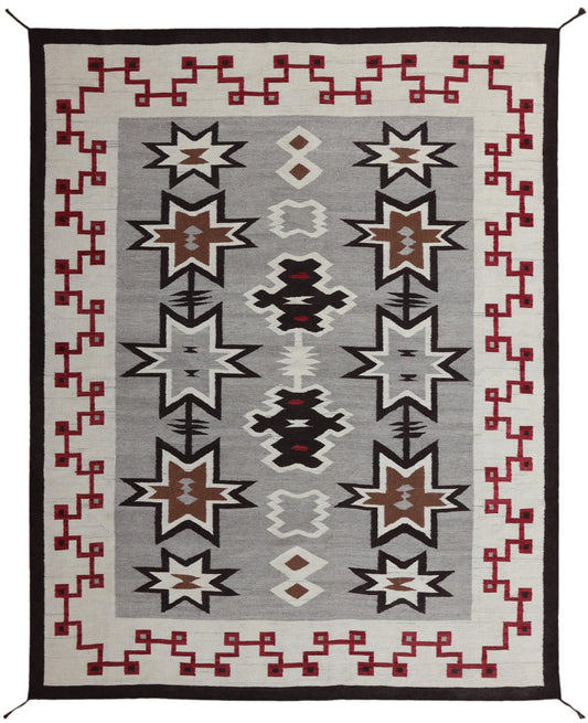 A rectangular Southwestern-style woven rug with a gray center field, cream border, and red, brown, black, and white geometric motifs. Atlantica Organics curates antique and handmade rugs, Persian, Afghan, Tibetan, Pakistani, Turkish Oushak, Kilim, Khotan, tribal and contemporary textiles for luxury interiors, homes and real estate. Our collections connect timeless craftsmanship with interior design, furniture, fine art, architecture and modern living. Explore curated rugs, collectible textiles, natural mate
