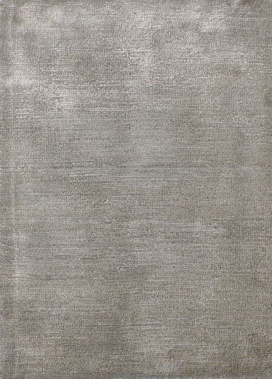 A square gray textured rug with a distressed, vintage-style woven pattern filling the entire frame.Atlantica Organics curates antique and handmade rugs, Persian, Afghan, Tibetan, Pakistani, Turkish Oushak, Kilim, Khotan, tribal and contemporary textiles for luxury interiors, homes and real estate. Our collections connect timeless craftsmanship with interior design, furniture, fine art, architecture and modern living. Explore curated rugs, collectible textiles, natural materials, cultural heritage, sustainab