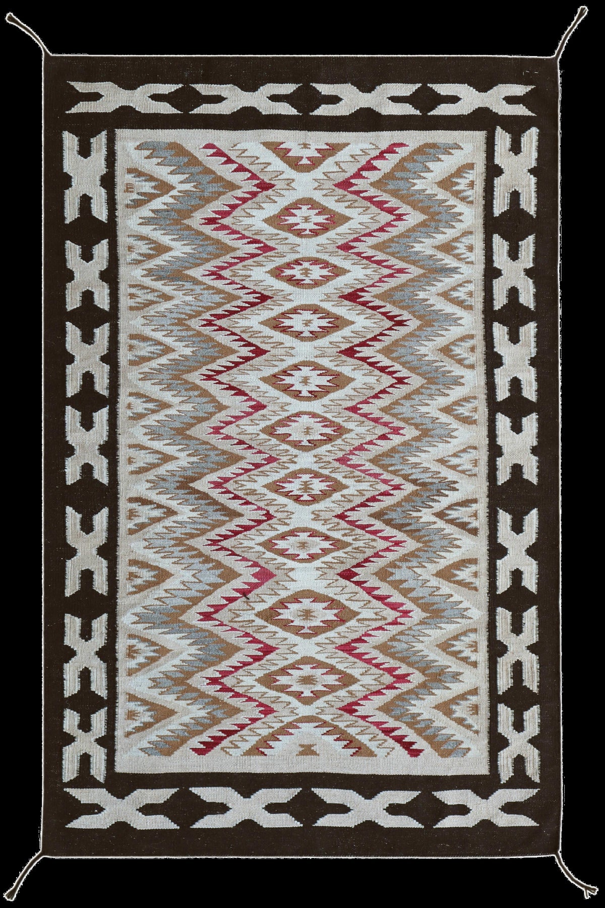 A rectangular Southwestern-style area rug with a geometric diamond and zigzag pattern, featuring a cream center, brown and beige bands, and a dark brown border with white accents.Atlantica Organics curates antique and handmade rugs, Persian, Afghan, Tibetan, Pakistani, Turkish Oushak, Kilim, Khotan, tribal and contemporary textiles for luxury interiors, homes and real estate. Our collections connect timeless craftsmanship with interior design, furniture, fine art, architecture and modern living. Explore cur
