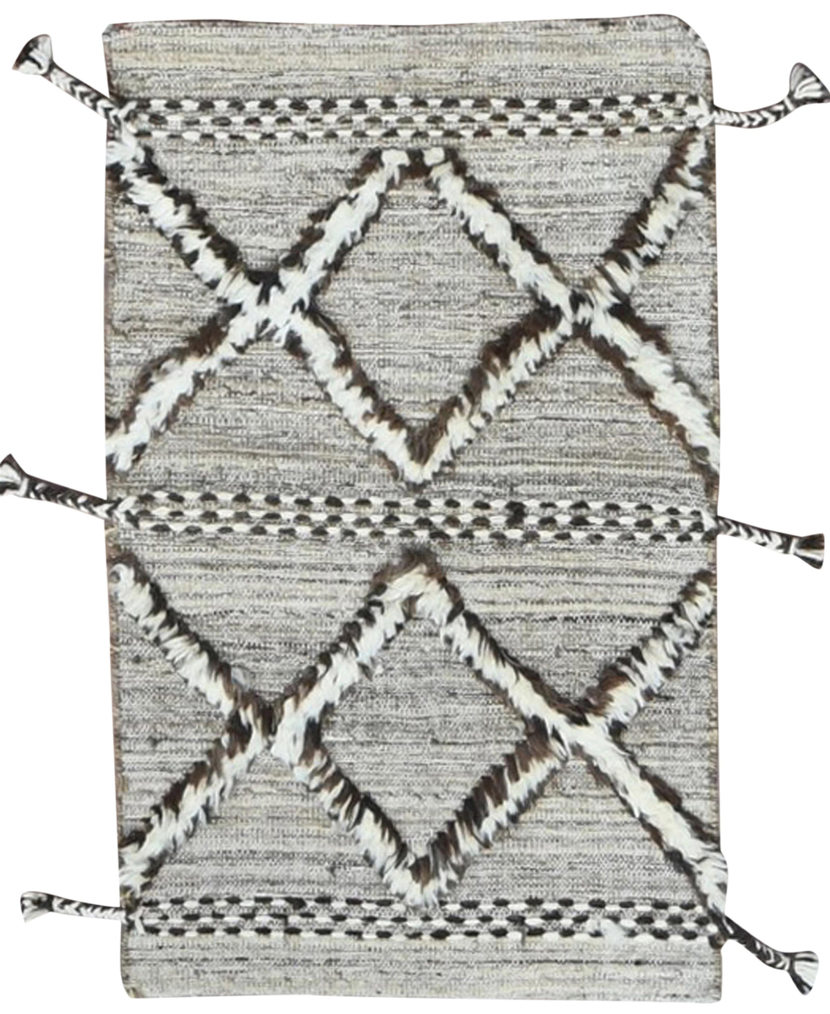 A rectangular woven rug with a textured gray and white base, featuring a bold geometric diamond pattern in white and dark brown, finished with decorative tassels on the corners and sides.Atlantica Organics curates antique and handmade rugs, Persian, Afghan, Tibetan, Pakistani, Turkish Oushak, Kilim, Khotan, tribal and contemporary textiles for luxury interiors, homes and real estate. Our collections connect timeless craftsmanship with interior design, furniture, fine art, architecture and modern living. Exp