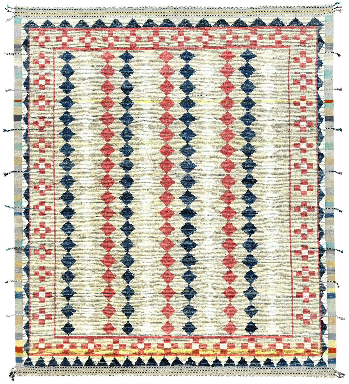 A square woven rug with a geometric pattern featuring vertical stripes of navy blue, coral red, and cream, bordered by a checkered and triangular patterned edge. Atlantica Organics curates antique and handmade rugs, Persian, Afghan, Tibetan, Pakistani, Turkish Oushak, Kilim, Khotan, tribal and contemporary textiles for luxury interiors, homes and real estate. Our collections connect timeless craftsmanship with interior design, furniture, fine art, architecture and modern living. Explore curated rugs, collec