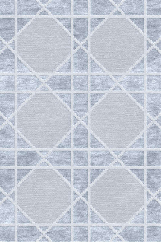 A close-up of a woven rug or fabric with a geometric diamond lattice pattern in light blue and white.Atlantica Organics curates antique and handmade rugs, Persian, Afghan, Tibetan, Pakistani, Turkish Oushak, Kilim, Khotan, tribal and contemporary textiles for luxury interiors, homes and real estate. Our collections connect timeless craftsmanship with interior design, furniture, fine art, architecture and modern living. Explore curated rugs, collectible textiles, natural materials, cultural heritage, sustain