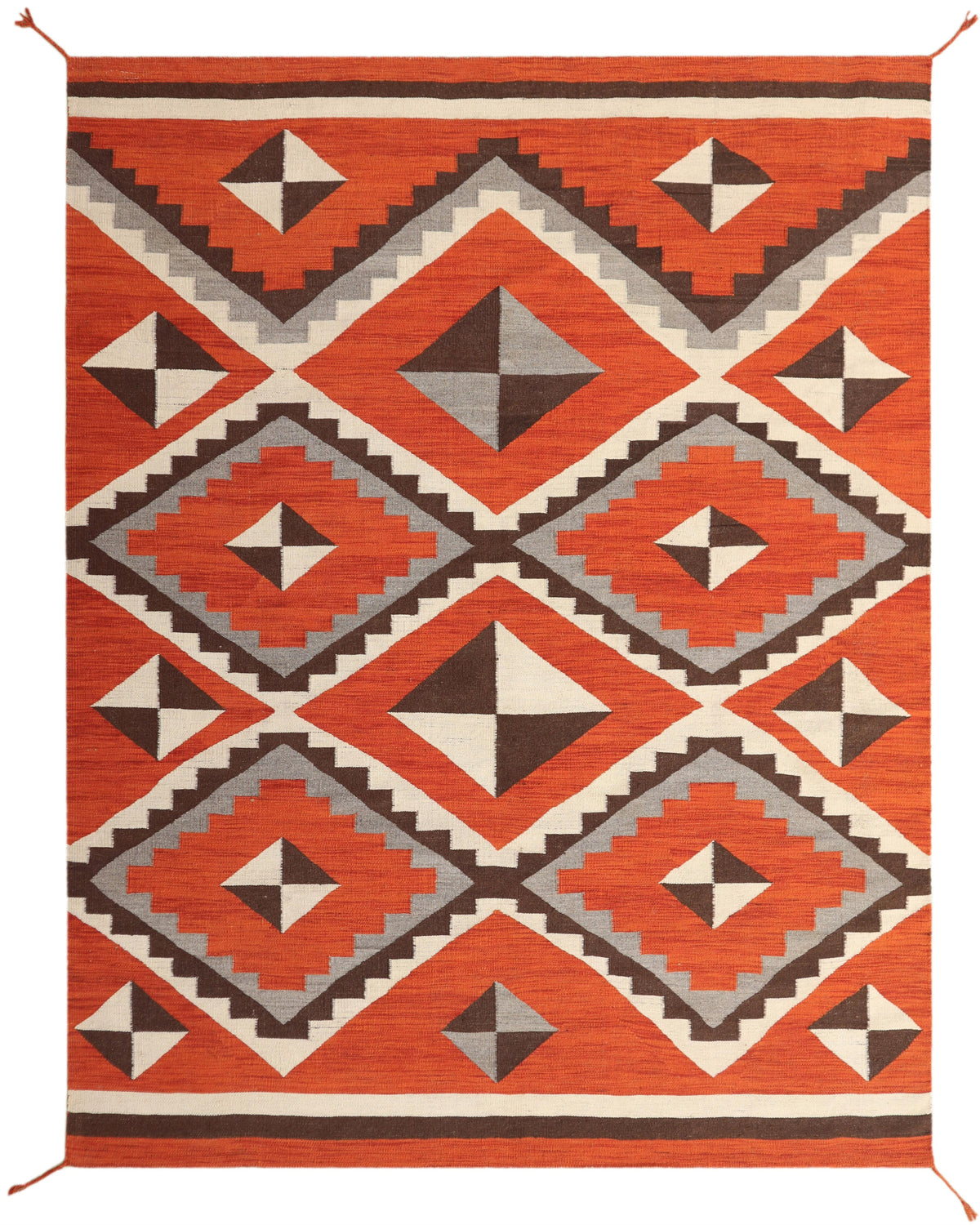 A rectangular woven rug with a bold Southwestern geometric pattern in terracotta orange, brown, cream, and light gray, shown flat against a white background.Atlantica Organics curates antique and handmade rugs, Persian, Afghan, Tibetan, Pakistani, Turkish Oushak, Kilim, Khotan, tribal and contemporary textiles for luxury interiors, homes and real estate. Our collections connect timeless craftsmanship with interior design, furniture, fine art, architecture and modern living. Explore curated rugs, collectible