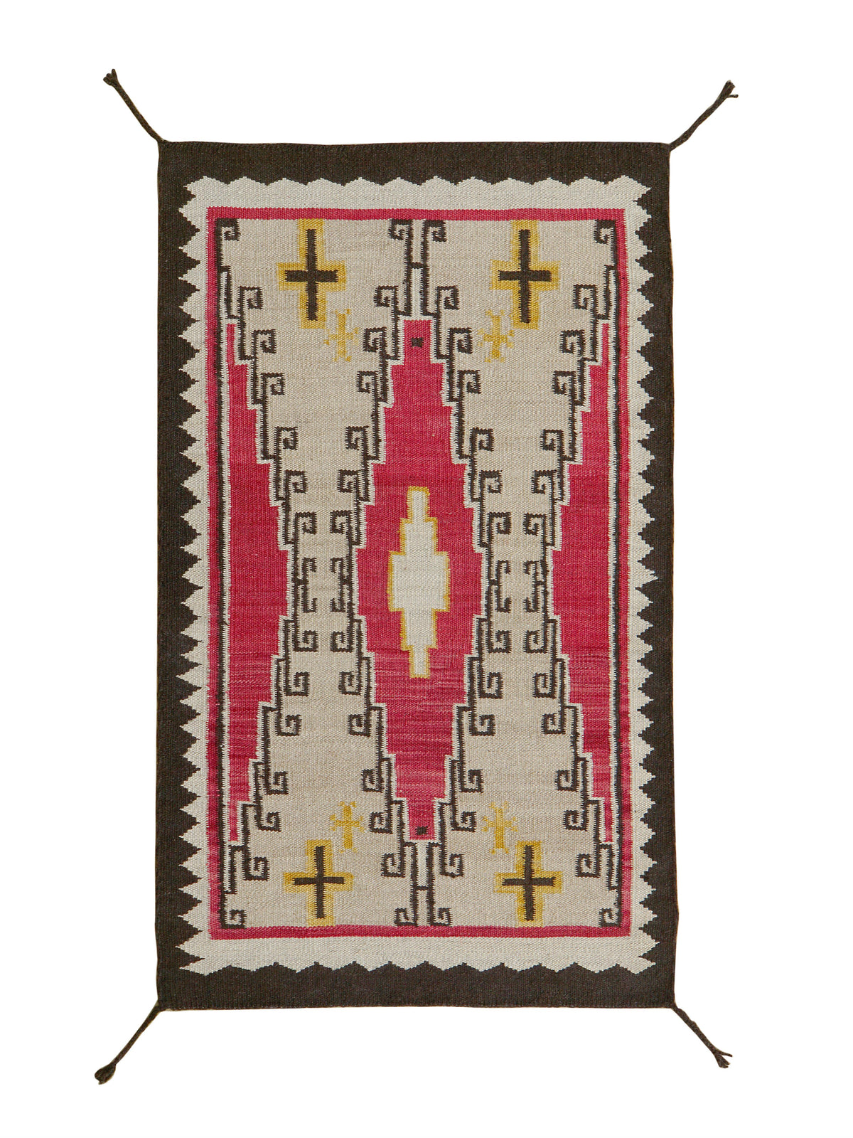 A rectangular woven rug with a Southwestern geometric pattern, featuring a dark brown border, a central pink field, cream-colored motifs, and yellow accents, shown flat against a white background.Atlantica Organics curates antique and handmade rugs, Persian, Afghan, Tibetan, Pakistani, Turkish Oushak, Kilim, Khotan, tribal and contemporary textiles for luxury interiors, homes and real estate. Our collections connect timeless craftsmanship with interior design, furniture, fine art, architecture and modern li