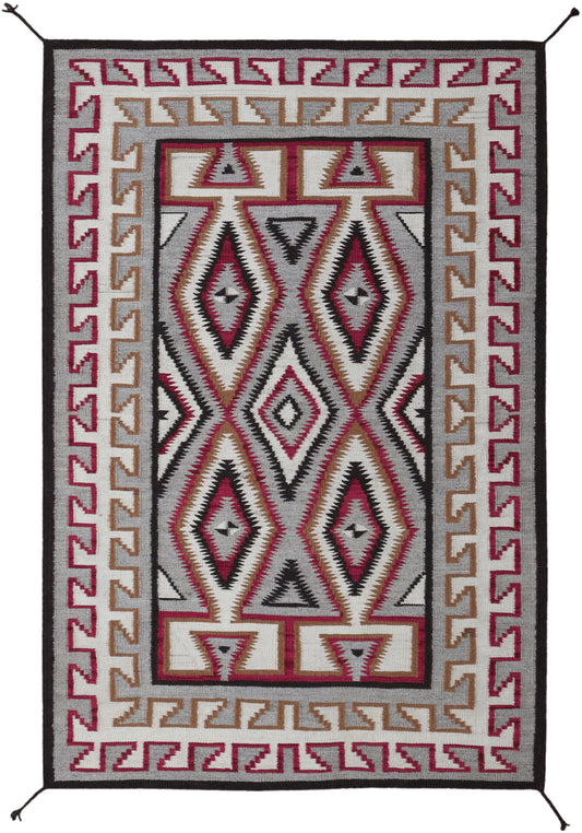 A rectangular woven rug with a Southwestern geometric pattern in red, black, gray, beige, and white, shown flat against a white background.
