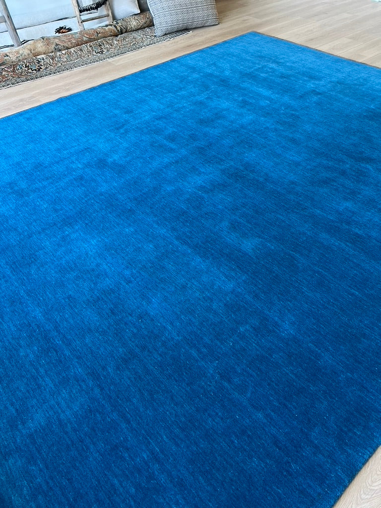 Explore our exquisite collection of handmade rugs, ranging from antique and vintage to modern designs. Each rug is a testament to skilled craftsmanship, offering timeless beauty and elegance. Elevate your space with the warmth and artistry of our handcrafted carpets.