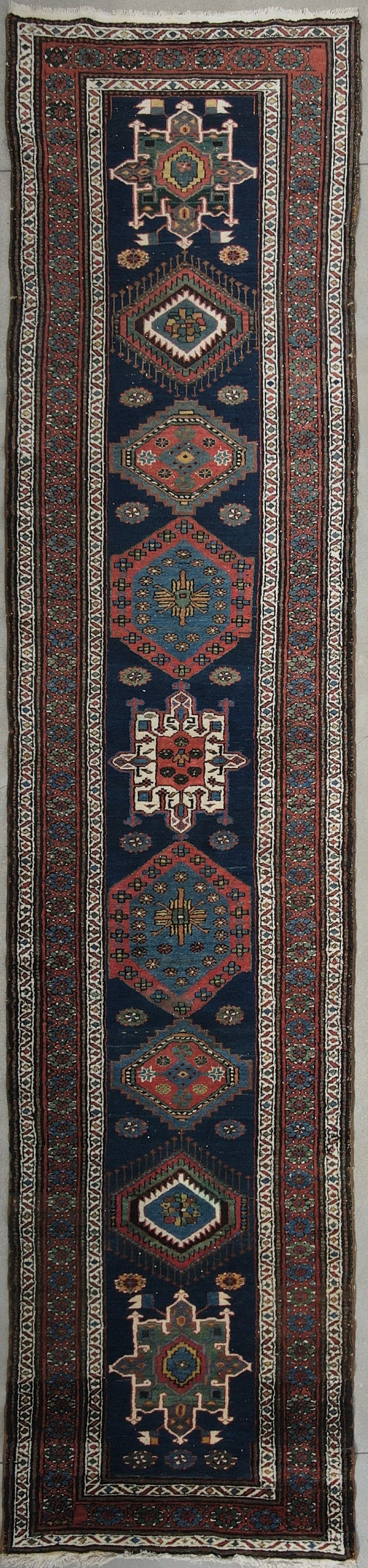 Explore our exquisite collection of handmade rugs, ranging from antique and vintage to modern designs. Each rug is a testament to skilled craftsmanship, offering timeless beauty and elegance. Elevate your space with the warmth and artistry of our handcrafted carpets.